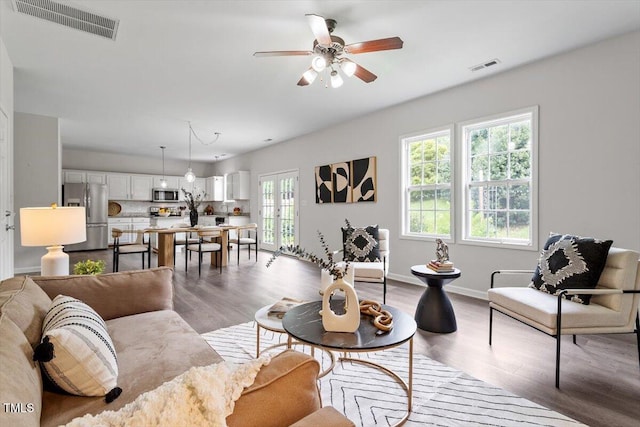 1643 Southcross St, Fuquay Varina, NC 27526 - living room with a ceiling fan and wood finished floors