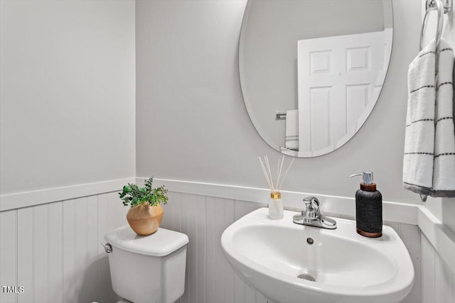 1643 Southcross St, Fuquay Varina, NC 27526 - bathroom featuring a sink and wainscoting