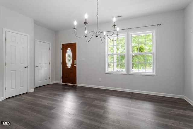 1643 Southcross St, Fuquay Varina, NC 27526 - foyer featuring a chandelier and dark wood-type flooring