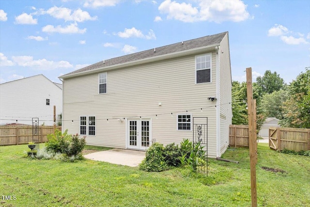 1643 Southcross St, Fuquay Varina, NC 27526 - back of property with french doors, a patio area, and a fenced backyard