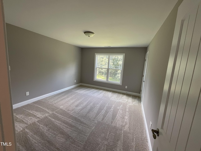 1034 Snapdragon Dr, Wake Forest, NC 27587 - spare room with carpet flooring and baseboards
