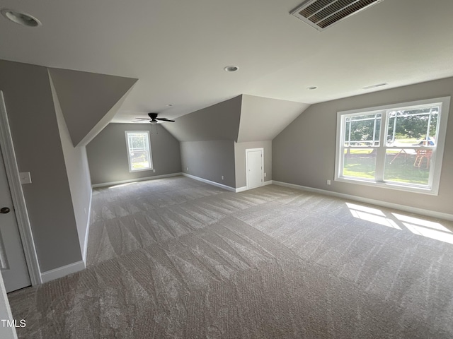 1034 Snapdragon Dr, Wake Forest, NC 27587 - additional living space featuring carpet flooring, lofted ceiling, and ceiling fan