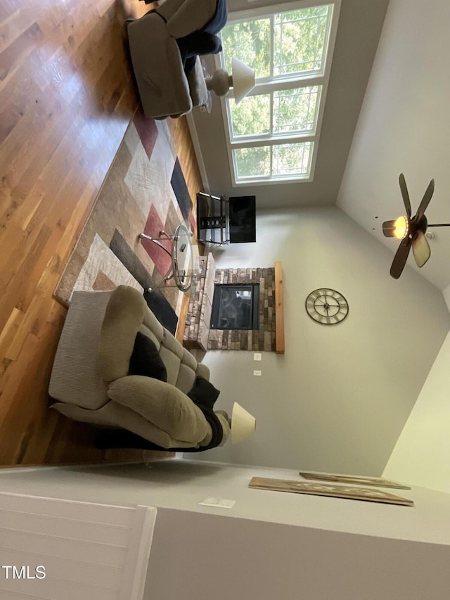 1034 Snapdragon Dr, Wake Forest, NC 27587 - living room with vaulted ceiling and wood finished floors