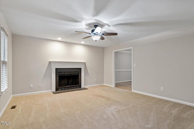 903 Norood Ln, Apex, NC 27502 - unfurnished living room featuring ceiling fan, carpet floors, a fireplace with flush hearth, and recessed lighting