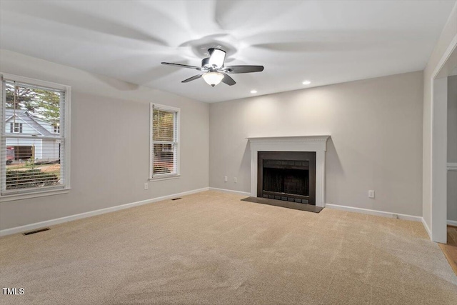 903 Norood Ln, Apex, NC 27502 - unfurnished living room featuring ceiling fan, carpet, a fireplace with flush hearth, and recessed lighting