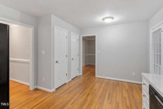 903 Norood Ln, Apex, NC 27502 - unfurnished bedroom featuring light wood finished floors