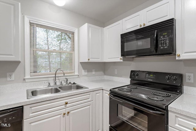 903 Norood Ln, Apex, NC 27502 - kitchen with black appliances and white cabinets