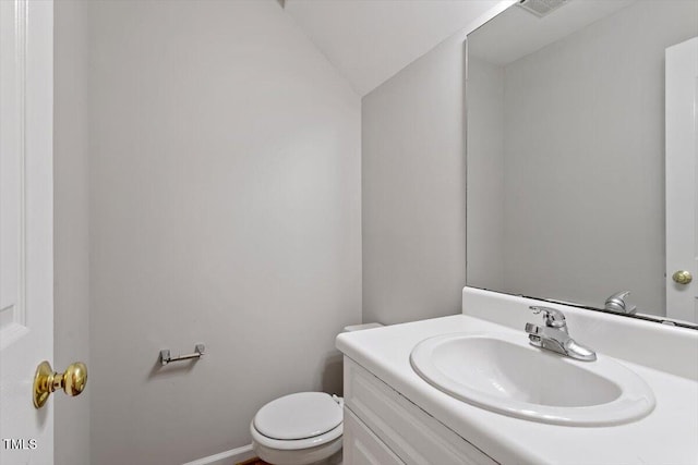 903 Norood Ln, Apex, NC 27502 - half bathroom with vanity and lofted ceiling
