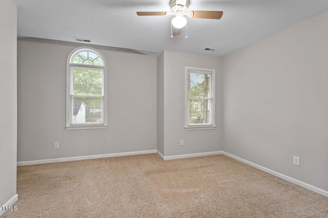 903 Norood Ln, Apex, NC 27502 - spare room featuring ceiling fan and carpet floors