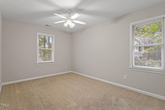 903 Norood Ln, Apex, NC 27502 - empty room with carpet, plenty of natural light, and ceiling fan