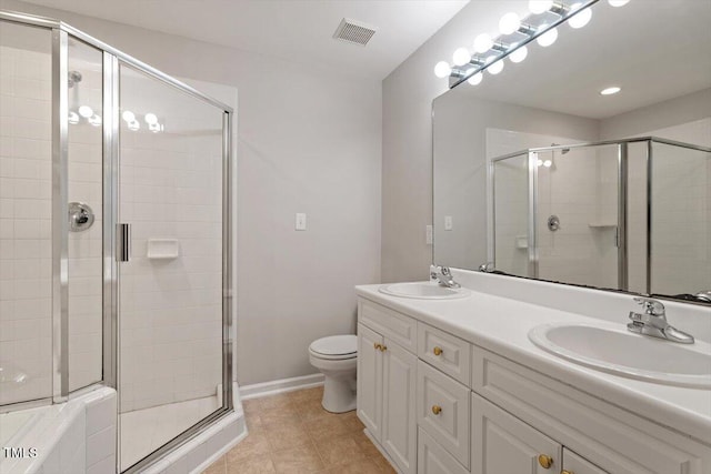 903 Norood Ln, Apex, NC 27502 - full bathroom featuring a shower stall, double vanity, tile patterned floors, and recessed lighting