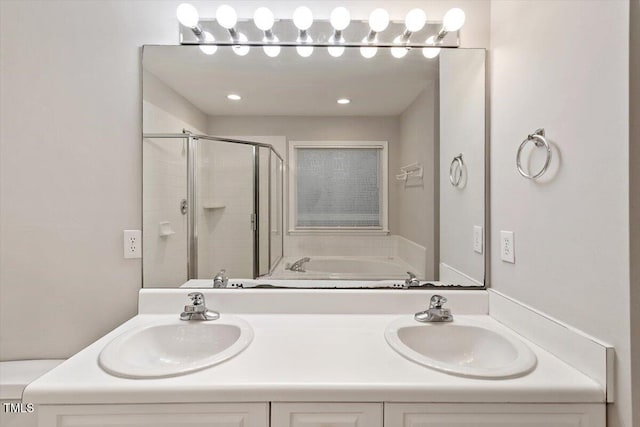 903 Norood Ln, Apex, NC 27502 - bathroom with a shower stall, a garden tub, and double vanity