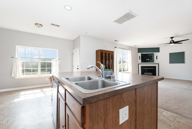 2486 Ingleside Dr, High Point, NC 27265 - kitchen with healthy amount of natural light, ceiling fan, light tile patterned floors, and open floor plan