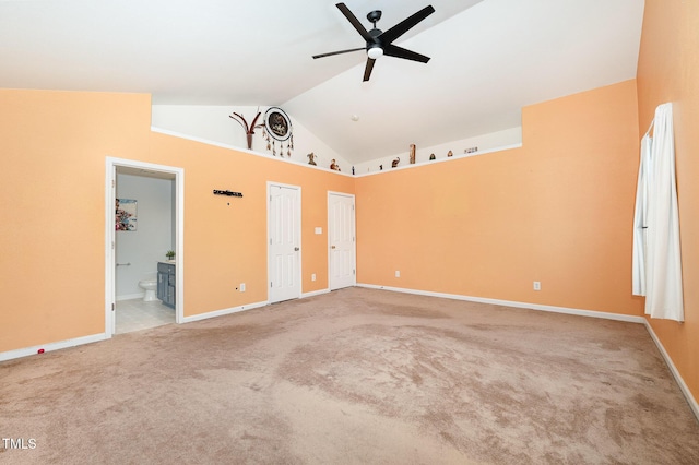 2486 Ingleside Dr, High Point, NC 27265 - unfurnished bedroom with carpet, ensuite bathroom, multiple closets, and high vaulted ceiling