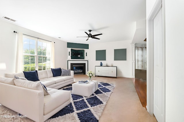 2486 Ingleside Dr, High Point, NC 27265 - living area with a ceiling fan and a glass covered fireplace