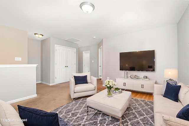 2486 Ingleside Dr, High Point, NC 27265 - living area with baseboards and wood finished floors