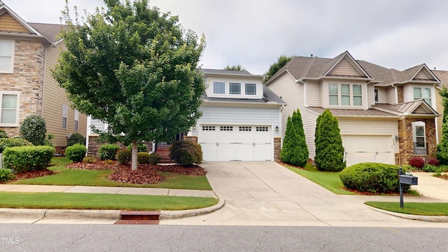 1524 Lily Creek Dr, Cary, NC 27518 - view of front facade with an attached garage, stone siding, and concrete driveway