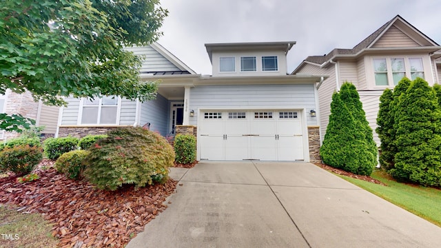 1524 Lily Creek Dr, Cary, NC 27518 - view of front of home with stone siding, concrete driveway, and a garage