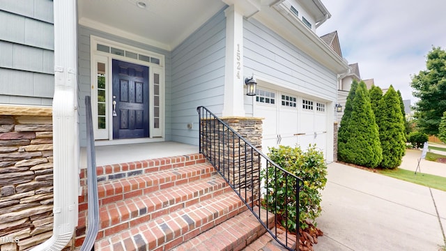 1524 Lily Creek Dr, Cary, NC 27518 - doorway to property featuring stone siding and driveway
