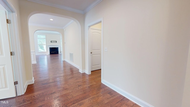 1524 Lily Creek Dr, Cary, NC 27518 - corridor featuring crown molding, wood finished floors, arched walkways, and recessed lighting