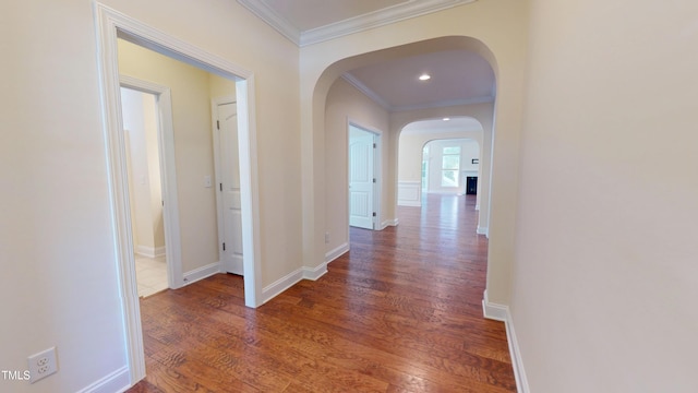 1524 Lily Creek Dr, Cary, NC 27518 - corridor with arched walkways, ornamental molding, and wood finished floors