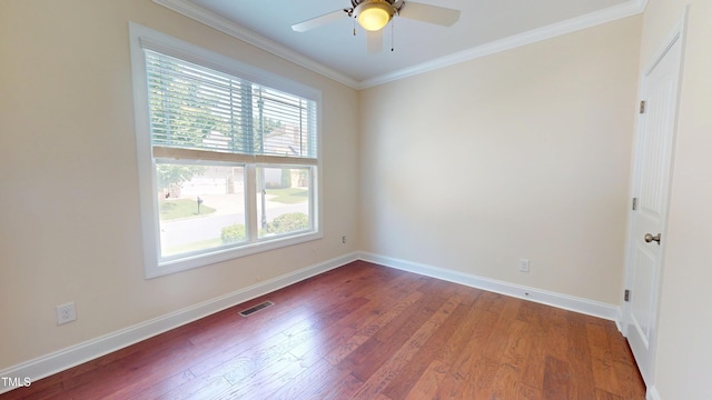 1524 Lily Creek Dr, Cary, NC 27518 - empty room featuring a ceiling fan, wood finished floors, and ornamental molding