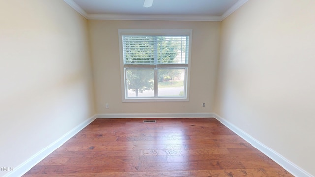 1524 Lily Creek Dr, Cary, NC 27518 - unfurnished room featuring wood finished floors, crown molding, and a ceiling fan
