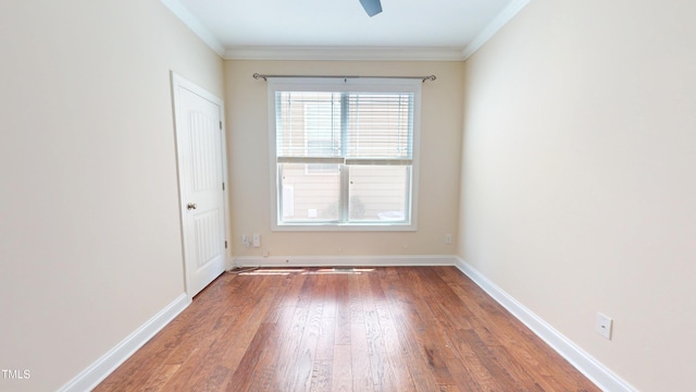 1524 Lily Creek Dr, Cary, NC 27518 - empty room with wood finished floors and crown molding