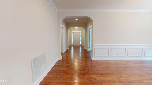 1524 Lily Creek Dr, Cary, NC 27518 - corridor with arched walkways, ornamental molding, and wood finished floors