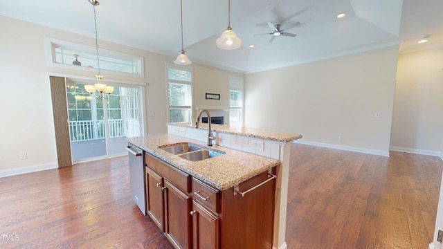 1524 Lily Creek Dr, Cary, NC 27518 - kitchen with dark wood finished floors, open floor plan, a center island with sink, pendant lighting, and recessed lighting