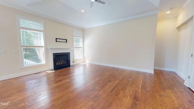 1524 Lily Creek Dr, Cary, NC 27518 - unfurnished living room with ceiling fan, ornamental molding, wood finished floors, a fireplace with flush hearth, and recessed lighting