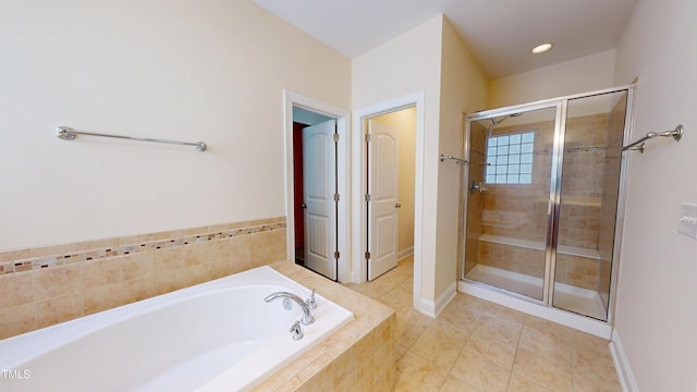 1524 Lily Creek Dr, Cary, NC 27518 - bathroom featuring a garden tub, a stall shower, and tile patterned flooring