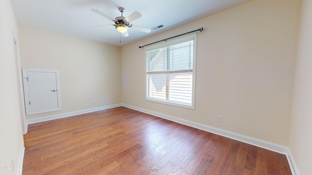 1524 Lily Creek Dr, Cary, NC 27518 - spare room with wood finished floors and ceiling fan