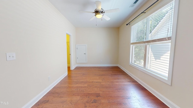 1524 Lily Creek Dr, Cary, NC 27518 - unfurnished room with wood finished floors and a ceiling fan
