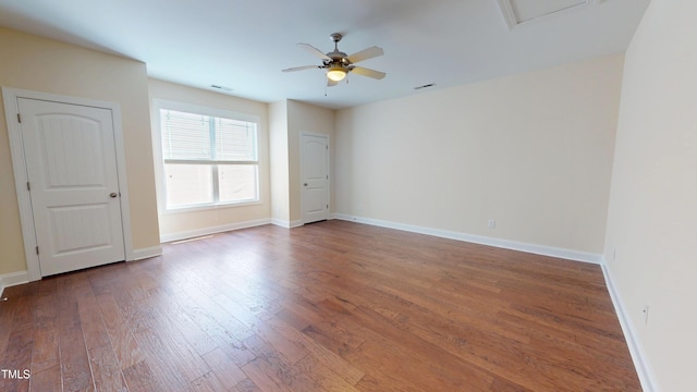 1524 Lily Creek Dr, Cary, NC 27518 - empty room featuring a ceiling fan and wood finished floors