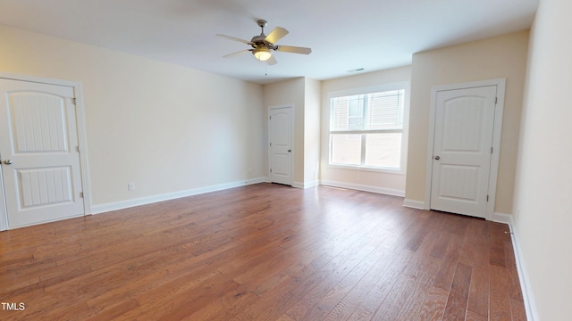1524 Lily Creek Dr, Cary, NC 27518 - empty room with ceiling fan and hardwood / wood-style floors