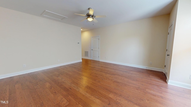 1524 Lily Creek Dr, Cary, NC 27518 - spare room featuring light wood-style flooring, attic access, and a ceiling fan