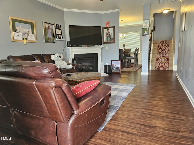 1303 Salters St, Burlington, NC 27215 - living area with crown molding, wood finished floors, and a glass covered fireplace