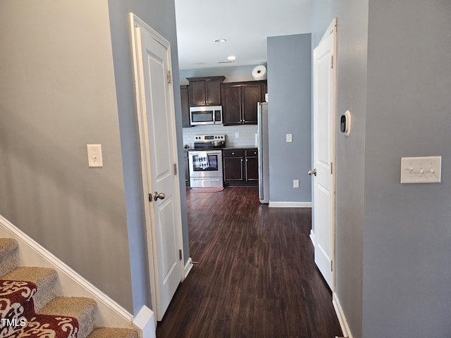 1303 Salters St, Burlington, NC 27215 - hall with dark wood-style floors, stairway, and recessed lighting