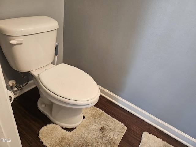 1303 Salters St, Burlington, NC 27215 - bathroom with baseboards and wood finished floors