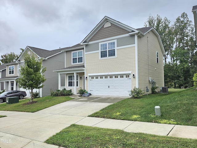 1303 Salters St, Burlington, NC 27215 - view of front of home featuring driveway, an attached garage, and a front yard