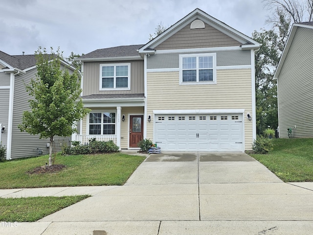 1303 Salters St, Burlington, NC 27215 - view of front of property featuring concrete driveway, a garage, a front yard, and board and batten siding