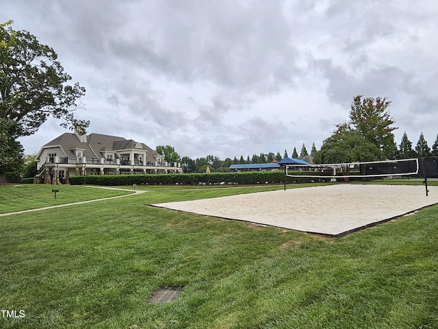 1303 Salters St, Burlington, NC 27215 - surrounding community with volleyball court and a lawn