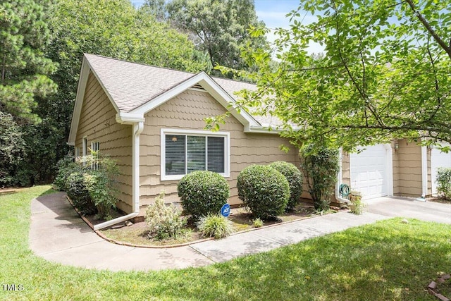 4201 Pin Oak Dr, Durham, NC 27707 - view of front of property featuring a shingled roof, an attached garage, concrete driveway, and a front yard