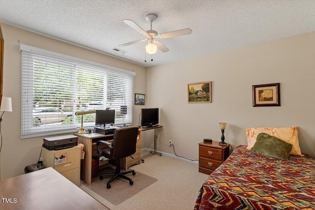 4201 Pin Oak Dr, Durham, NC 27707 - bedroom with light carpet, a desk, a textured ceiling, and ceiling fan