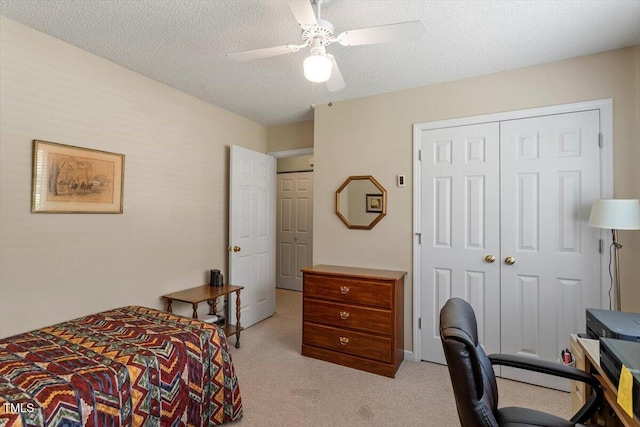 4201 Pin Oak Dr, Durham, NC 27707 - bedroom with light colored carpet, a closet, ceiling fan, a textured ceiling, and an office area