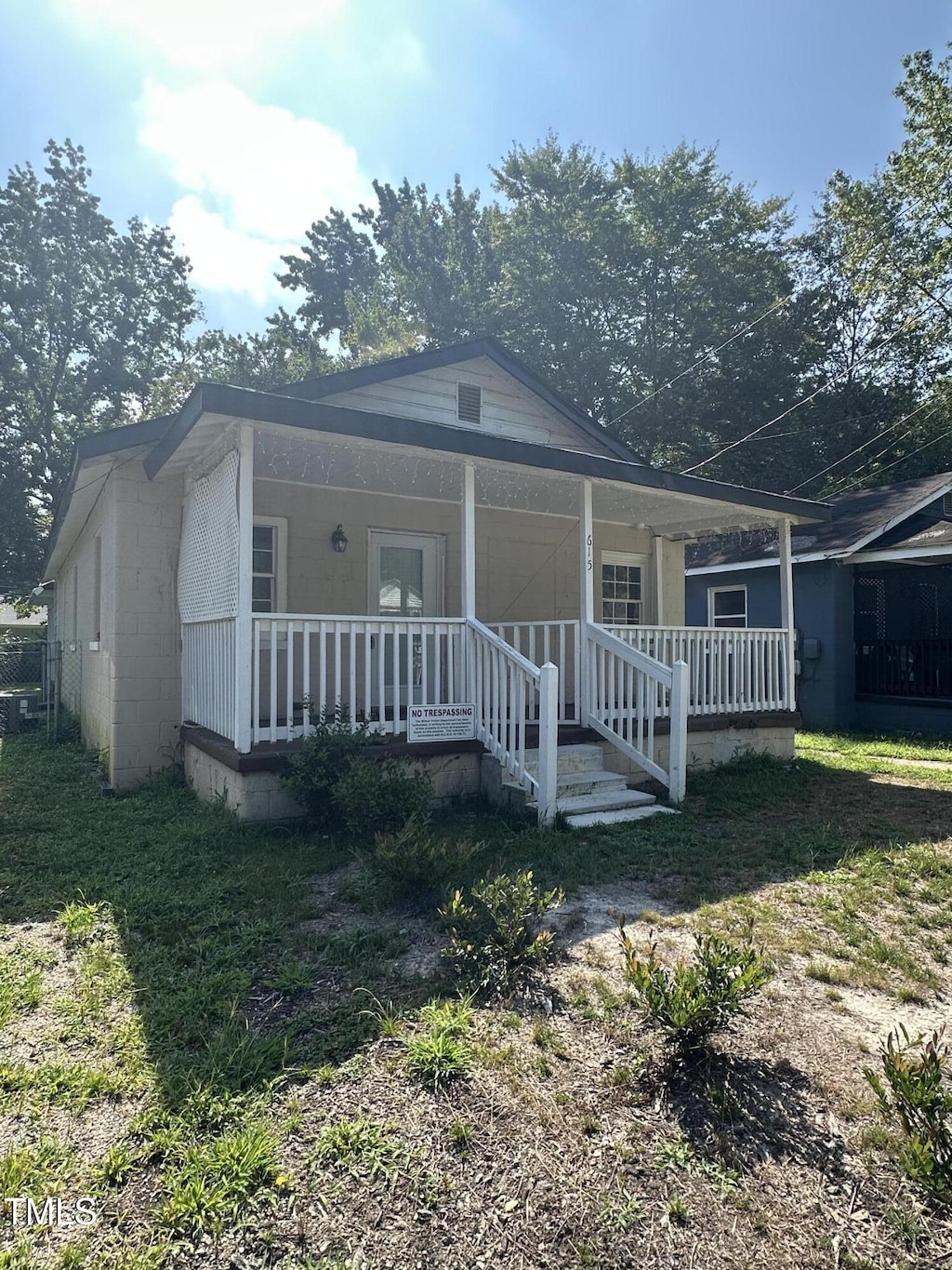 615 Manchester St SE, Wilson, NC 27893 - bungalow-style house featuring a porch and concrete block siding