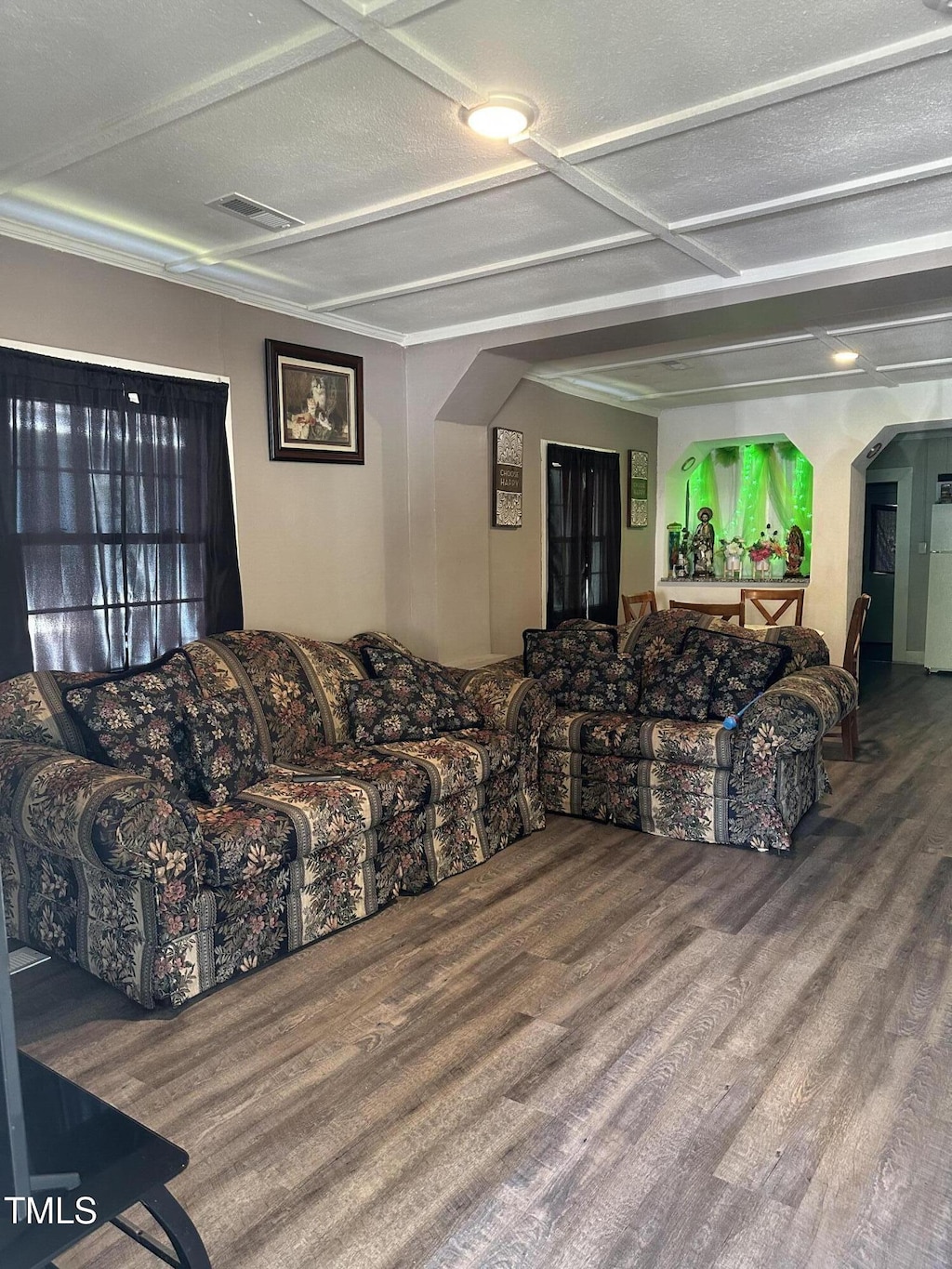 615 Manchester St SE, Wilson, NC 27893 - living room with arched walkways and wood finished floors