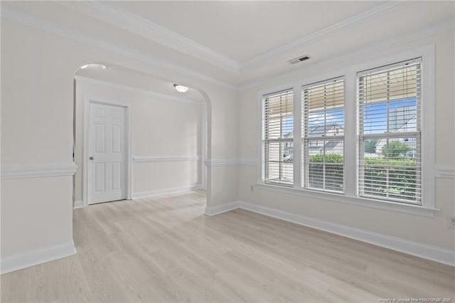 297 Colonist Pl, Cameron, NC 28326 - spare room with arched walkways, light wood-type flooring, and crown molding