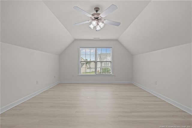 297 Colonist Pl, Cameron, NC 28326 - additional living space featuring light wood finished floors, ceiling fan, and vaulted ceiling